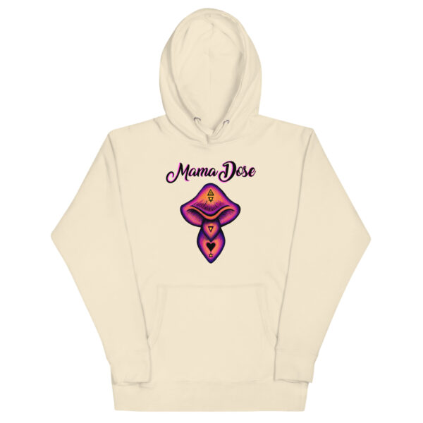 The Unisex Mama Dose Mushroom Hoodie is cream-colored and features "Mama Dose" text above a vibrant mushroom illustration adorned with eye and heart designs.