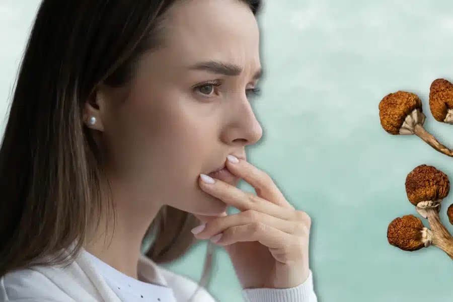 a woman suffering from anxiety and psilocybin mushrooms on the side