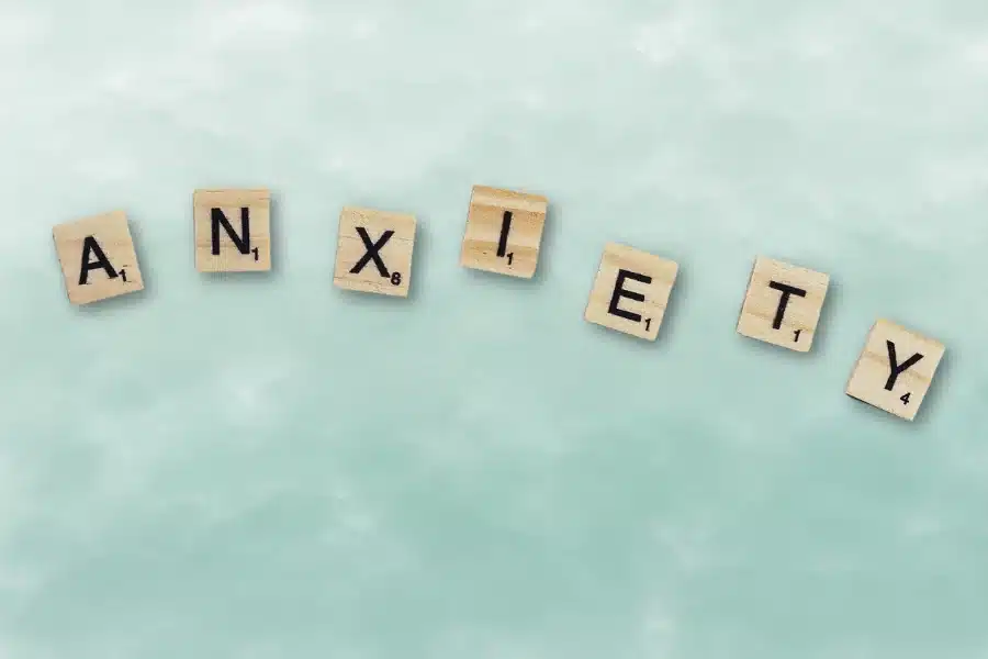 anxiety words on pastel background