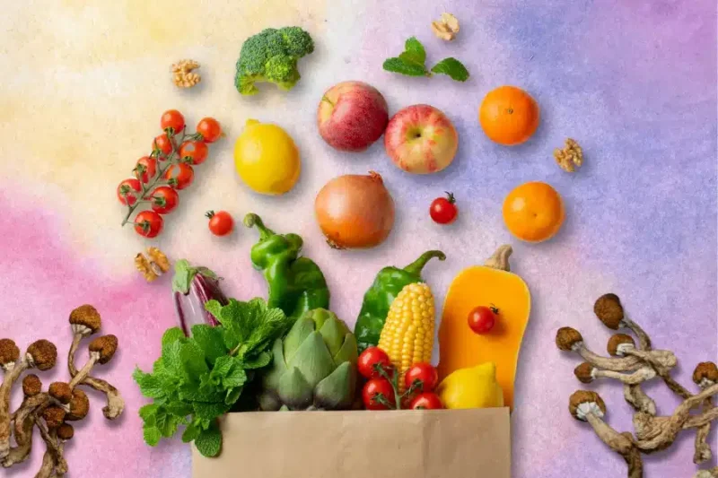 A paper bag brimming with vibrant fruits and vegetables like broccoli, apples, and cherry tomatoes sits against a colorful backdrop, embodying the essence of a microdosing diet.